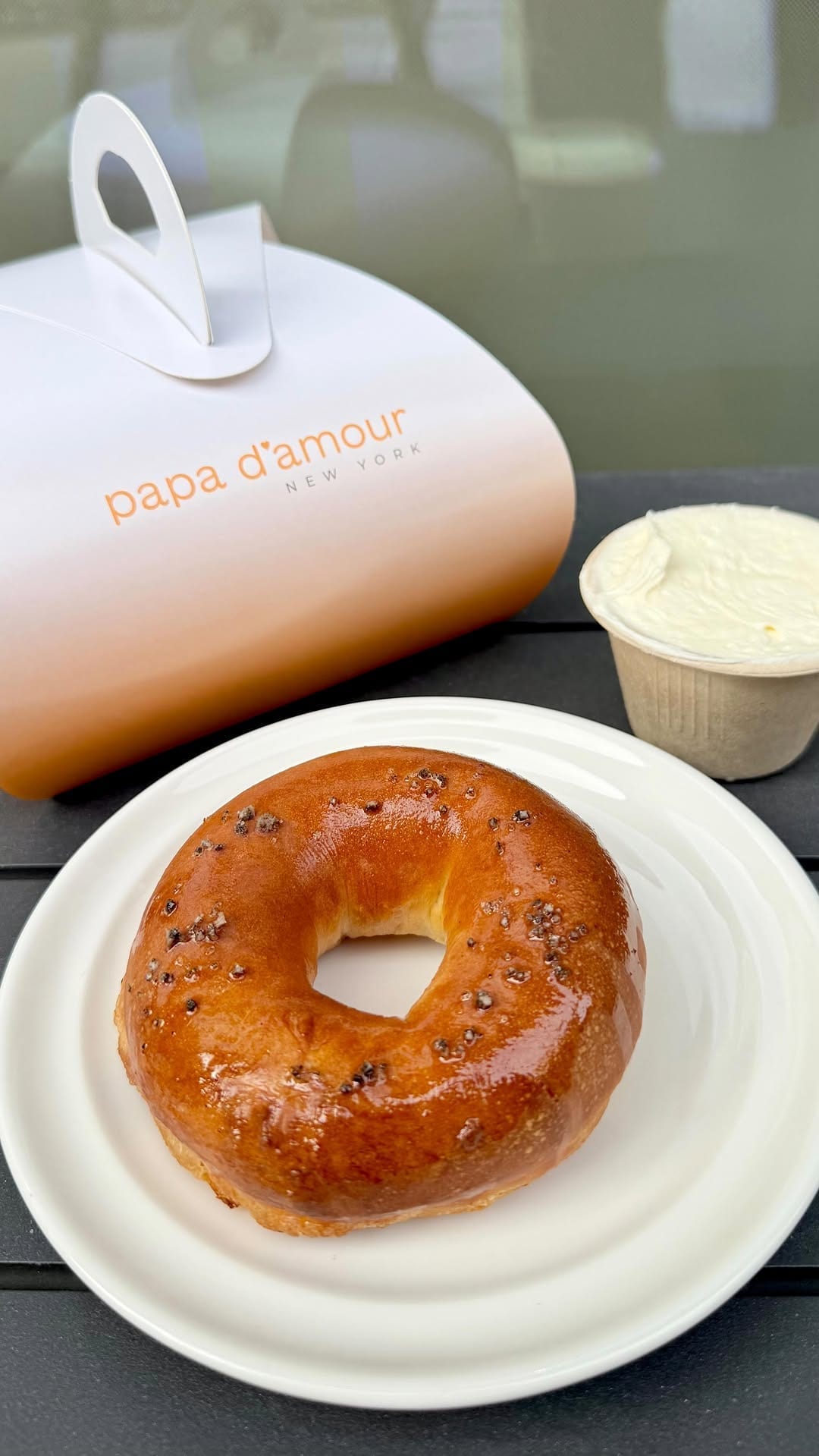 Salt Bread Bagel with golden crust and cheese spread